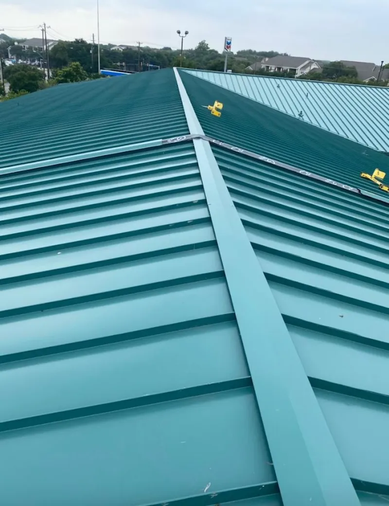 Green commercial metal roof ridge and valley for Metal Roof Repair in Belle Glade
